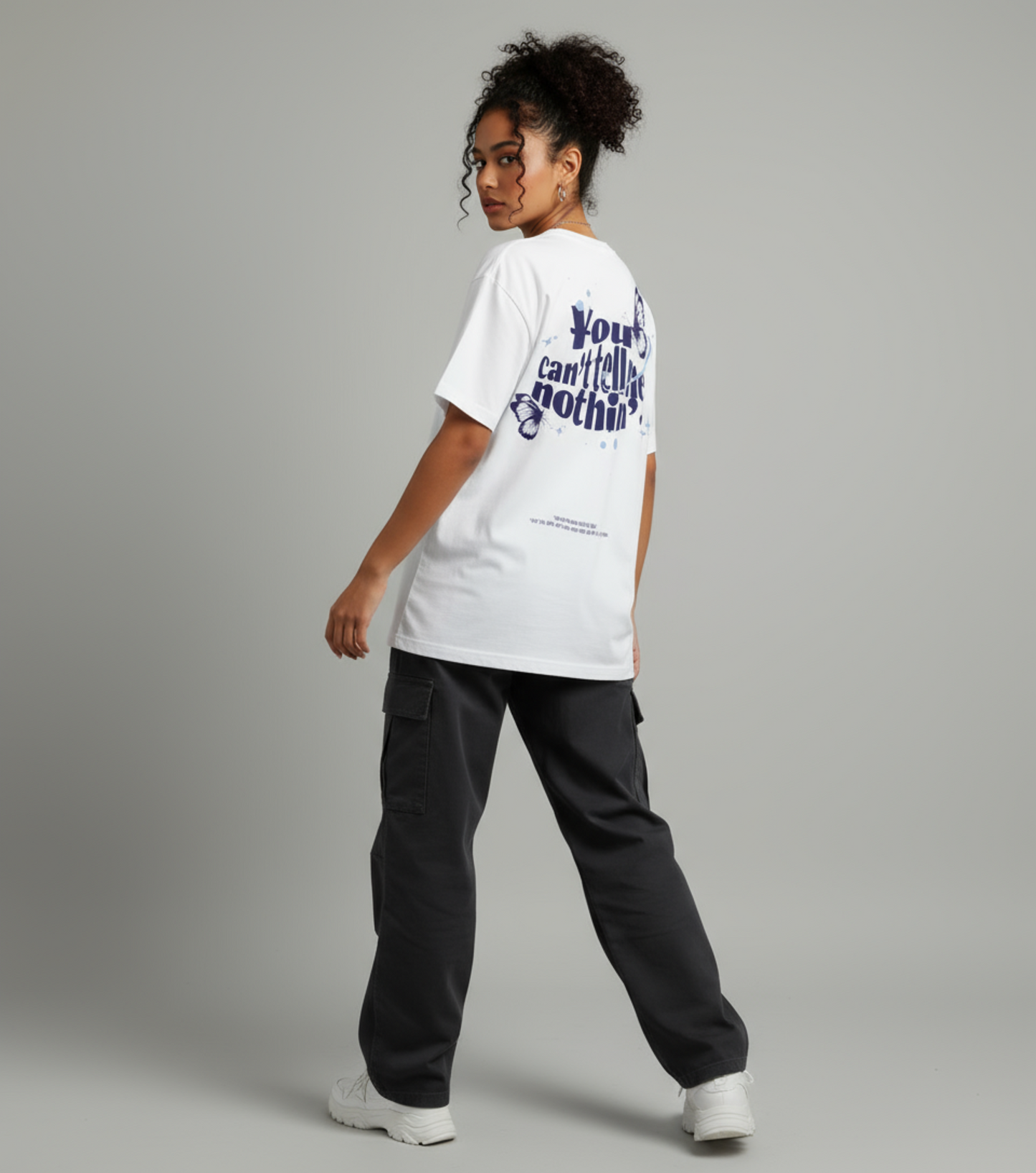 CAN’T TELL ME NOTHIN’ OVERSIZED UNISEX GRAPHIC T-SHIRT